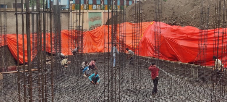 Completed commercial building with modern architecture in Indore by Bhavans Civiltech LLP