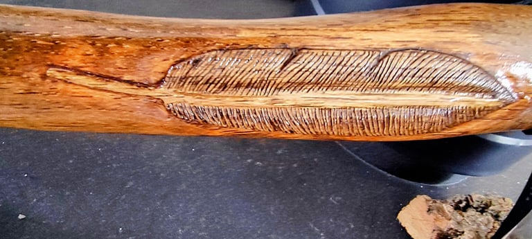 relief carved feather