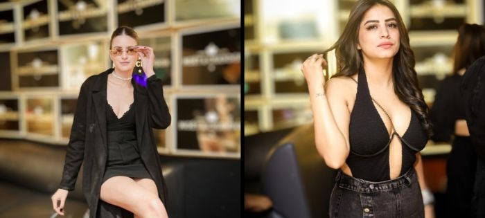 a woman in a black dress and a man in a suit