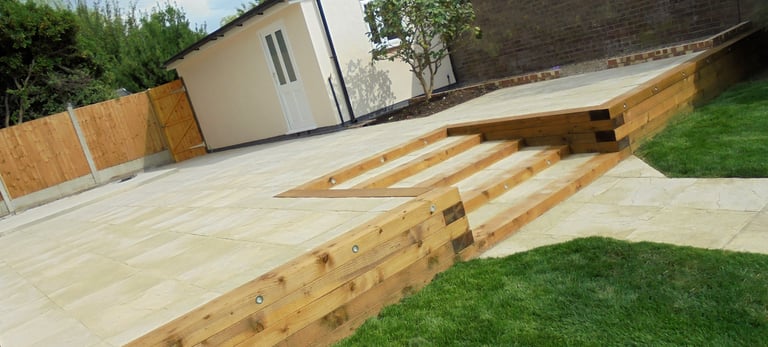 Large multi-level tiered garden makeover, sleeper retaining wall and steps elevated garden