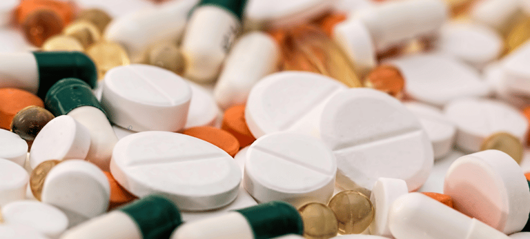 a bunch of pills on a table