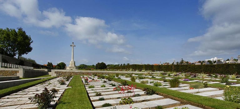 Boulogne Eastern (De L’Est) Cemetery, view with the Cross of Sacrifice in the distance.