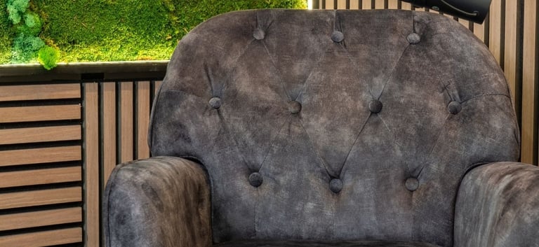 a chair with a mossel planter on it