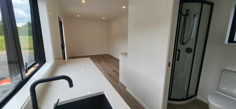 View of lounge from the kitchen in tiny home