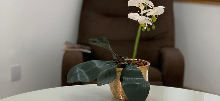 a table with a cup of coffee and a cup of coffee