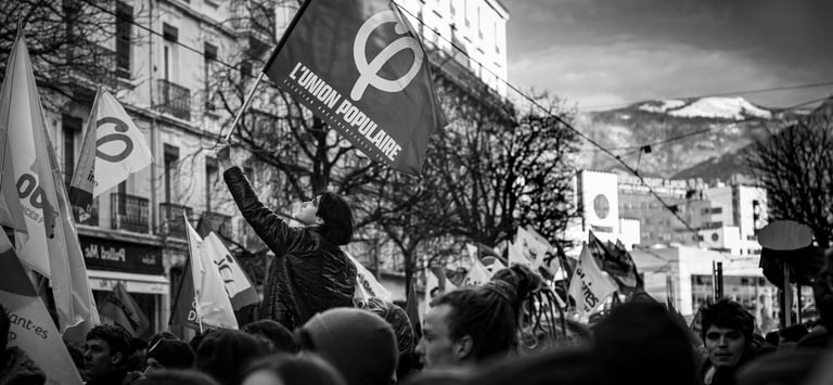 a women holding a banner in a strike