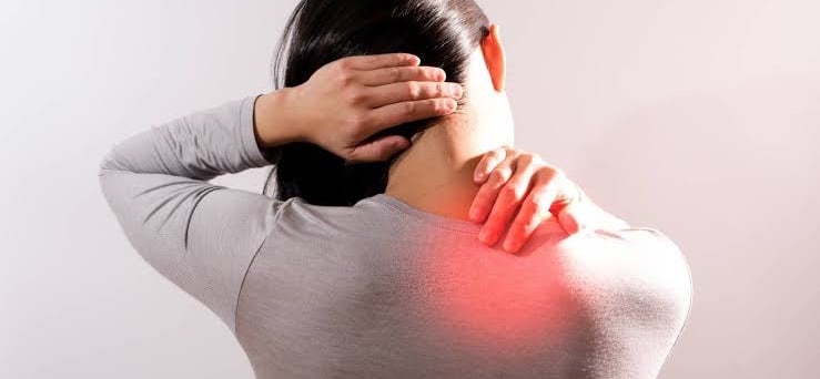 Illustration of cervical spine highlighting nerve compression causing neck pain.