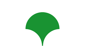 une feuille de Ginkgo Biloba verte en forme de T pour Tokyo.