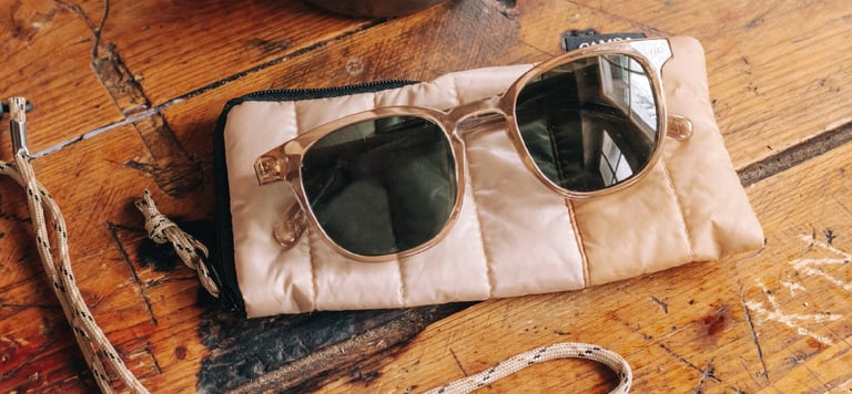 Stylish sunglasses with scratch resistant coating and case