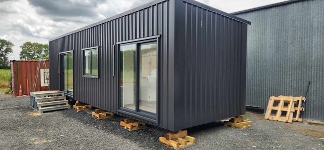 Tiny or transportable home with dark cladding