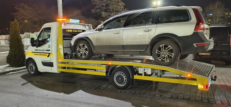 Transport pojazdów, holowanie, laweta, pomoc drogowa. Telefon 886 014 015