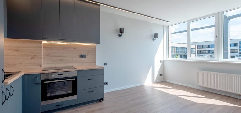 Modern kitchen with durable luxury vinyl plank flooring designed for moisture-prone spaces.