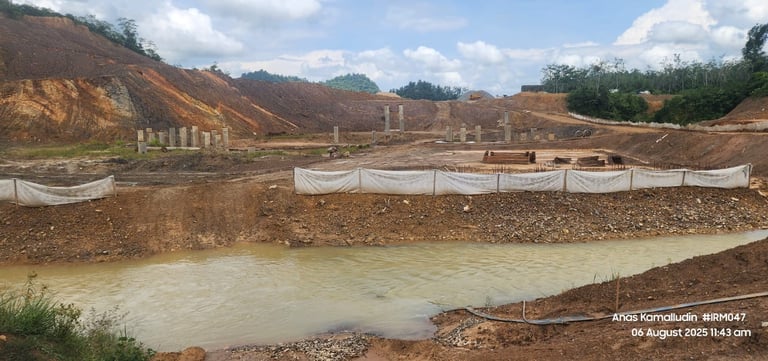 Silt fence installation near the river, bmp's or best management practice