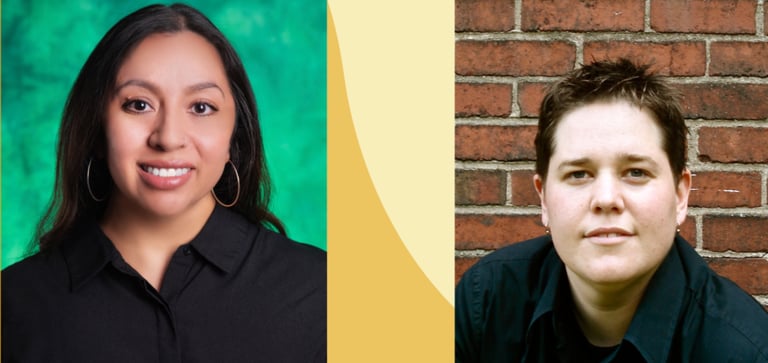 two people standing next to each other in front of a brick wall