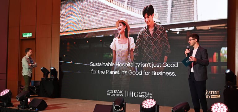 Rémi Lefèvre speaking on a stage at the IHG EAPAC F&B Conference about Sustainability in Hospitality