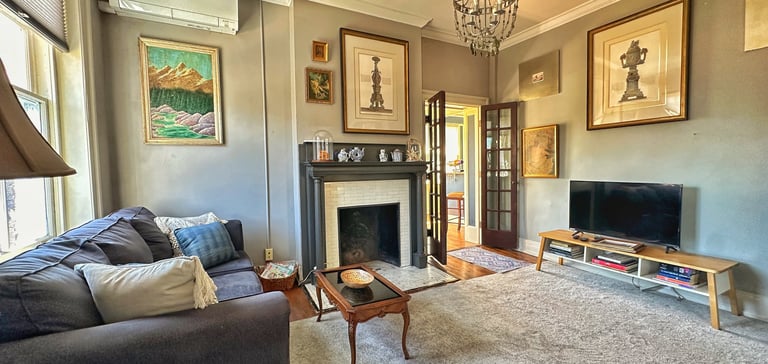 living room with couch and fireplace 2123 rivermont apartments