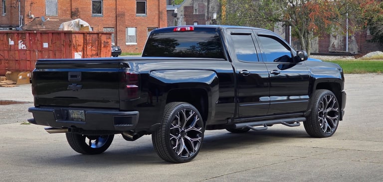 paint brought back to life on black truck by Stephen at reflections Detailing in Springfield Ohio