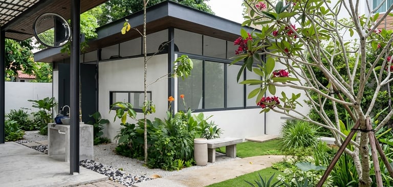Industrial park office landscape at EPMB Glenmarie featuring tropical gardens and stone paths.