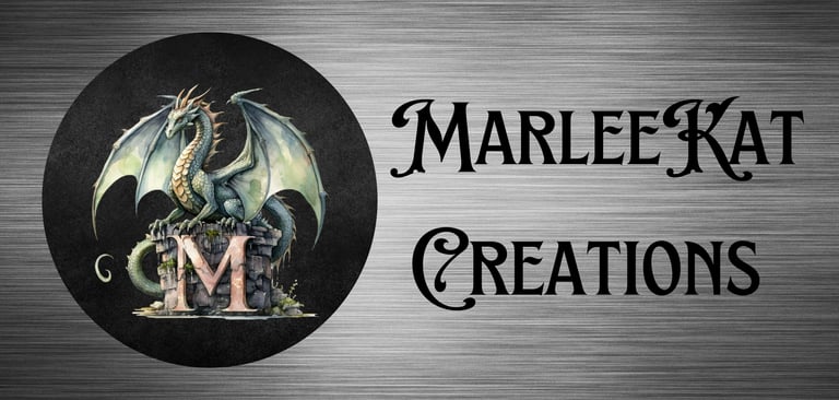 a dragon standing on a M and a sign that says marleekat creations