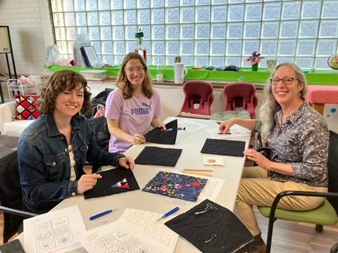 Reverse applique workshop participants