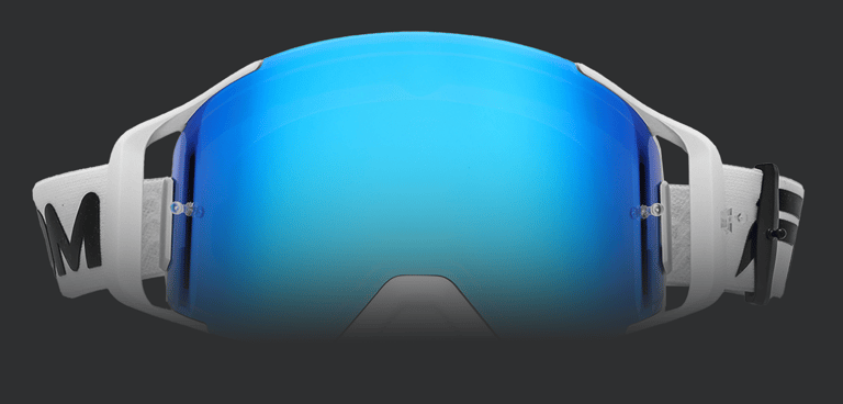 Masque de ski blanc et bleu, avec design moderne et matériaux de qualité, parfait pour une protection efficace contre l