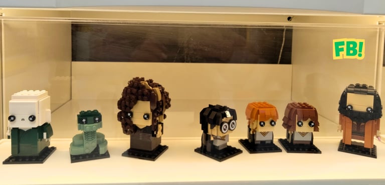 a display case with legos of harry potter themed legos