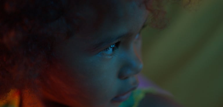 a woman with a long braid hair and a long dress