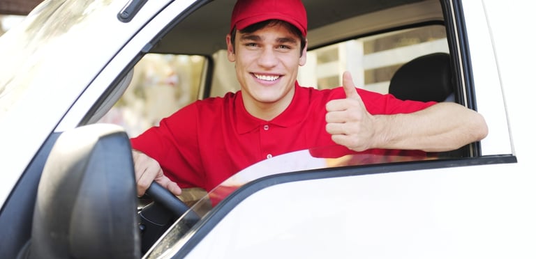 locksmith thumbs up from a truck