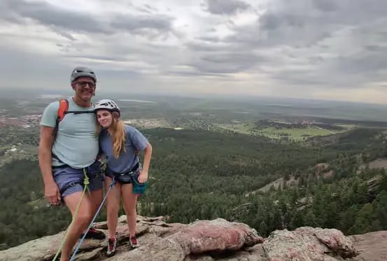 Two climbers navigating steep Flatiron ridge during guided climbing experience Boulder