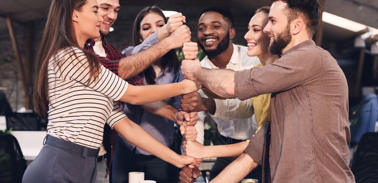 Group of working colleagues doing a collective skill game in an internal team event