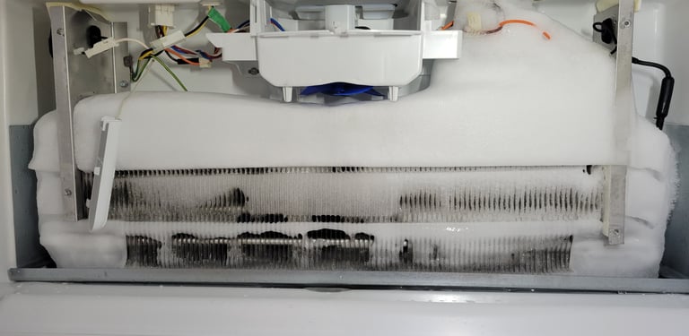 Maytag refrigerator ice buildup repair Norwalk