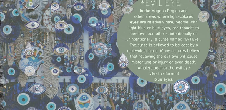 a wall hanging with evil eye eyeballs and evil eyeballs