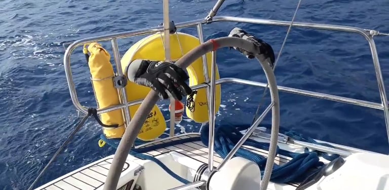 a boat steered by gloves. Copyright Vincent Volpe