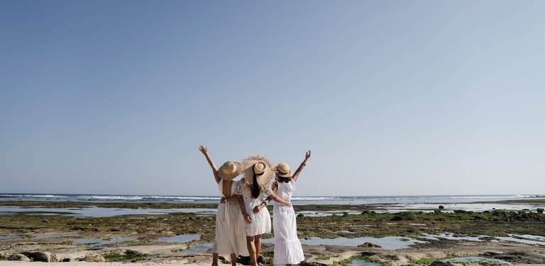 Friends group portrait on coastline during photoshoot at Melasti Beach Bali