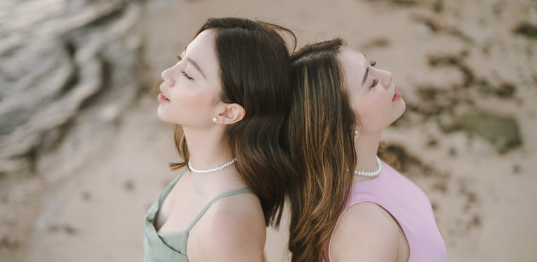 Close portrait of two friends during photoshoot at Geger Beach Nusa Dua Bali