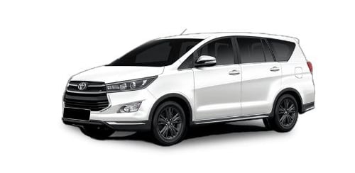 a white Toyota Innova car parked on a white background