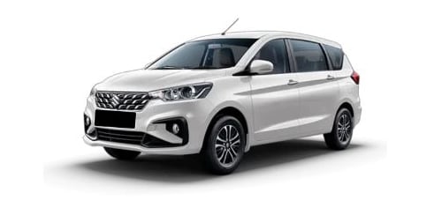 a white Maruti Ertiga car parked on a white background