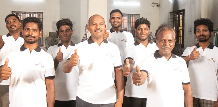 MP Asia Engineering Team With Thumbs Up posing on the plant