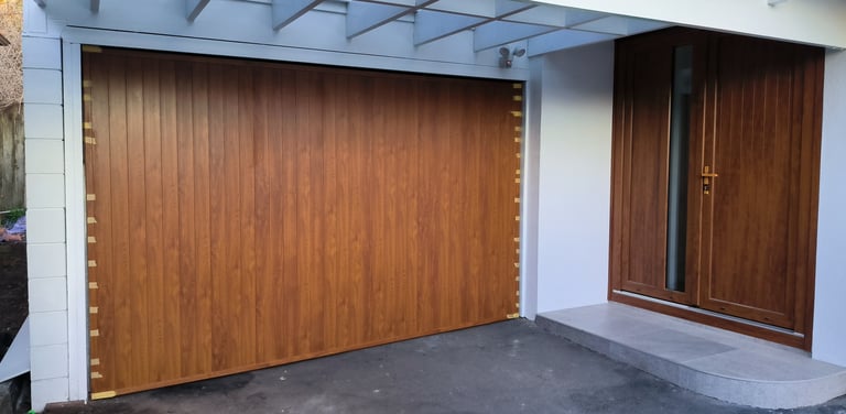 Insulated garage door upgrade improving home efficiency, Auckland, New Zealand