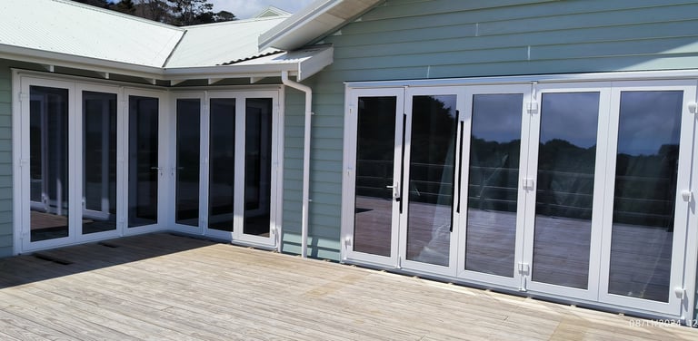Double-glazed window installation during new build construction, Auckland, New Zealand