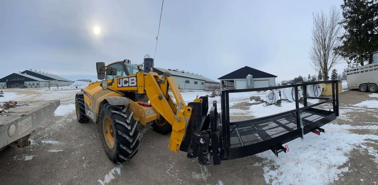telehandler/zoom boom lifting a 4x9 man basket work platform