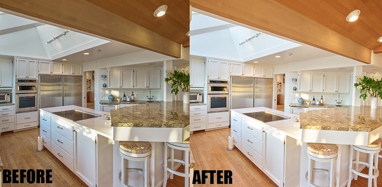 a kitchen with a large island and a large kitchen