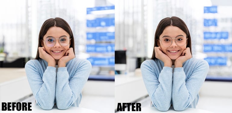 a woman with glasses and a blue sweater