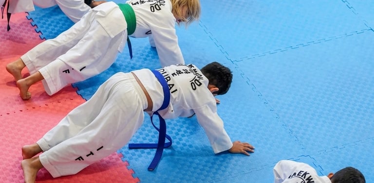 Children doing fitness conditioning in Taekwondo class Dubai