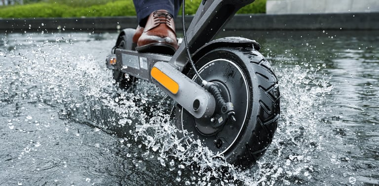 a person riding a scooter in the water