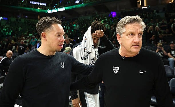 Mitch Johnson and Chris Finch, head coaches of the Spurs and Timberwolves, during game 6 (May 15, 2026)