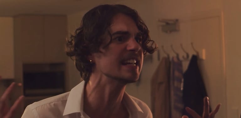 a man in a white shirt and a woman in a white shirt