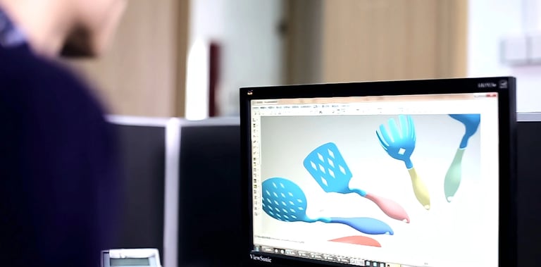Designer showing his design work in front of computer