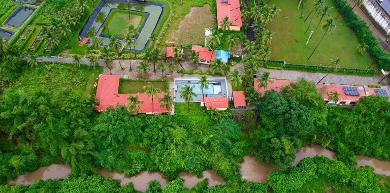 drone view of purna river retreat