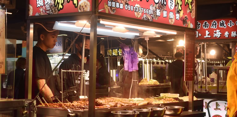 Puesto en mercado nocturno de Taipei